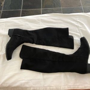 Black knee high boots. Brand new- worn once